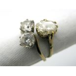 A 9ct Gold Two Stone Dress Ring, of crossover design; together with a single stone ring. (2)