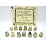 A Set of Twelve Hallmarked Silver Thimbles, "The Swann's Silver Thimble Collection", complete with