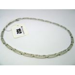 Tiffany & Co; An 18ct White Gold Diamond Set Atlas Necklace, stamped "Tiffany & Co. 1995 750".