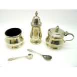 A Hallmarked Silver Three Piece Cruet Set, Walker & Hall, Birmingham 1967; together with a pair of