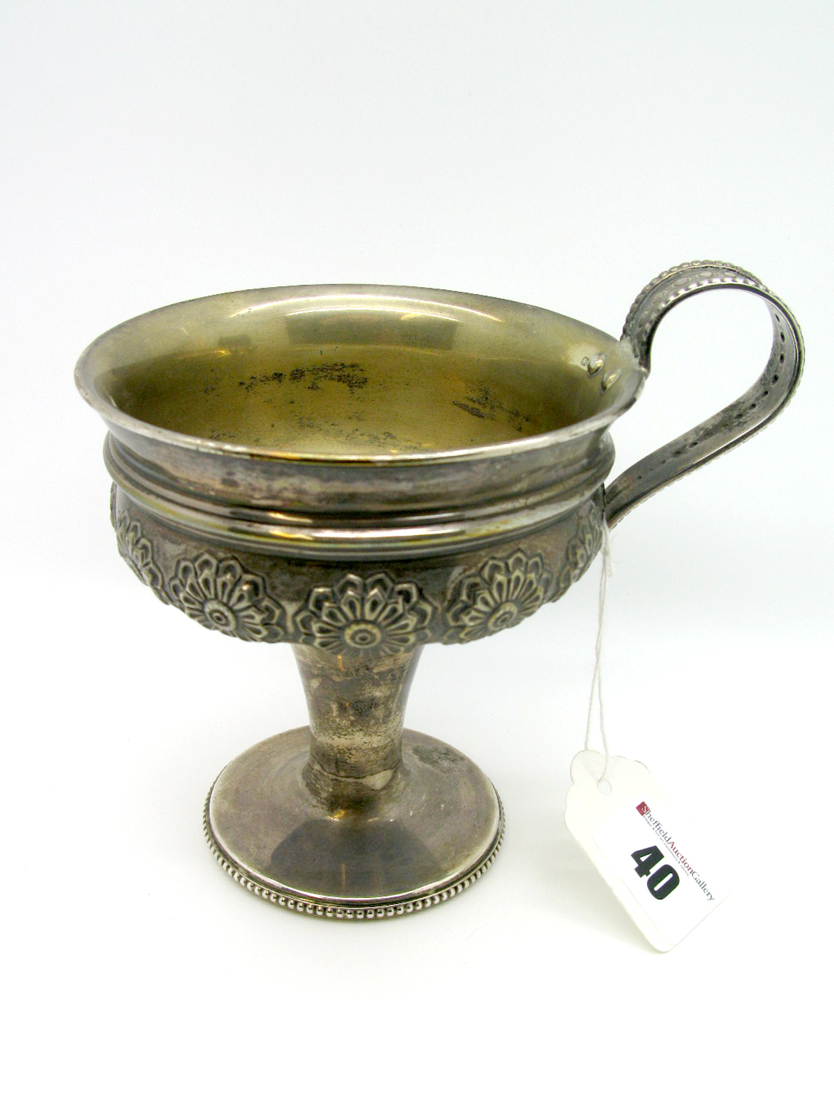 A Decorative Hallmarked Silver Pedestal Cup, Nathan & Hayes, Chester 1907, the shallow circular bowl