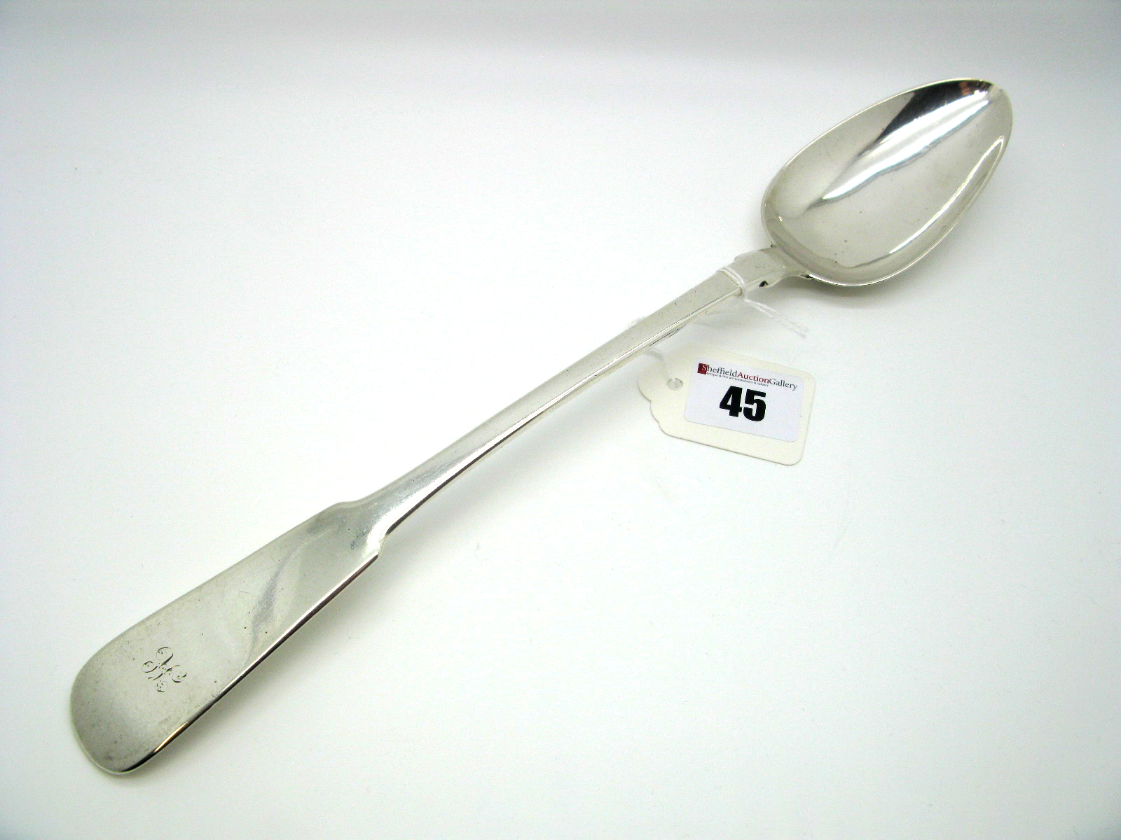 A Scottish Hallmarked Silver Fiddle Pattern Basting Spoon, James McKay, Edinburgh 1823, initialled.