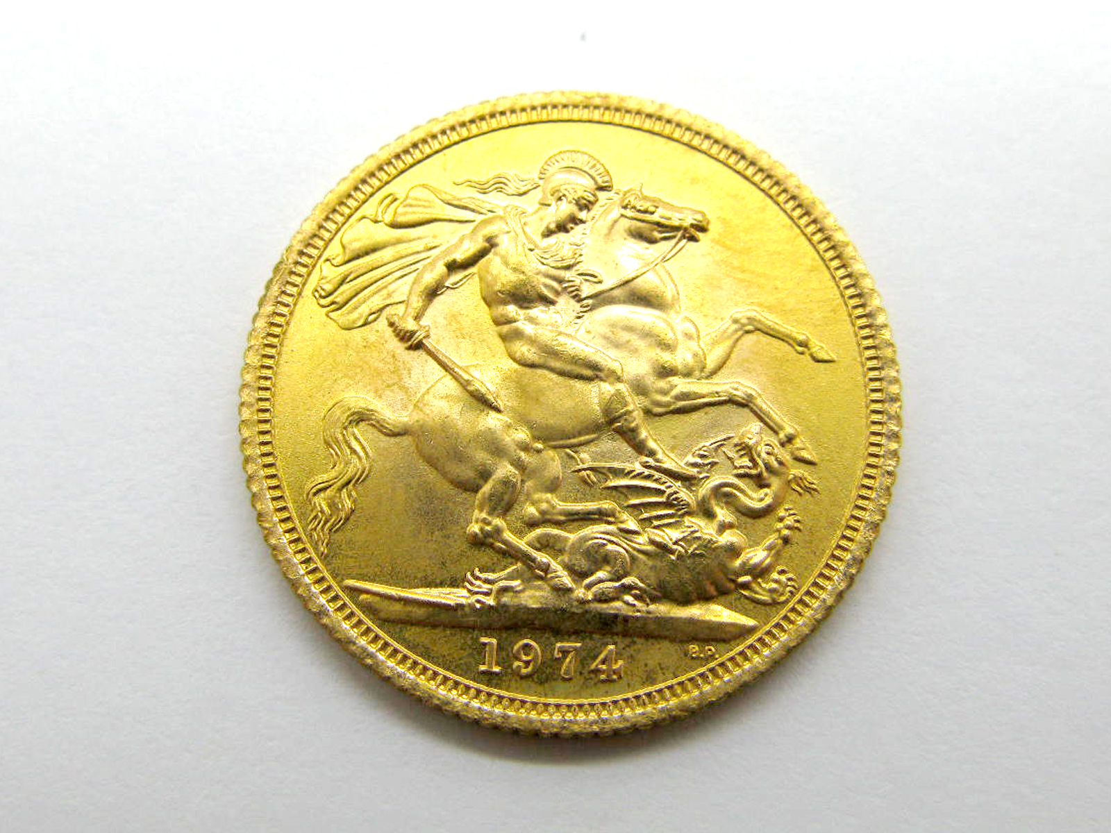 A 1974 Gold Sovereign, (uncirculated).