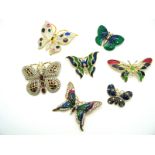 Seven Modern Enamel Butterfly Brooches.