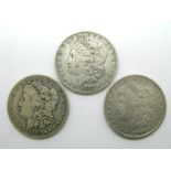 Three United States Silver Morgan One Dollar Coins, 1882, 1900 'O', 1891 'O'.