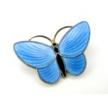 Aksel Holmsen; A Norwegian Enamel Butterfly Brooch, highlighted in black and blue, stamped "Norway