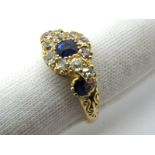 An 18ct Gold Sapphire and Diamond Set Cluster Ring, set throughout with old cut stones, Birmingham