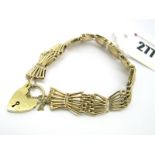 A 9ct Gold Fancy Link Bracelet, to 9ct gold heart shape paddock clasp.