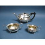 A Hallmarked Silver Three Piece Tea Set, (makers mark rubbed) Birmingham 1928, each of panelled