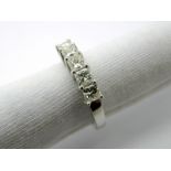 An 18ct White Gold Five Stone Princess Cut Diamond Half Eternity Style Ring, claw set throughout