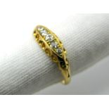 A Chester Hallmarked 18ct Gold Five Stone Diamond Ring, graduated set with old and single cut