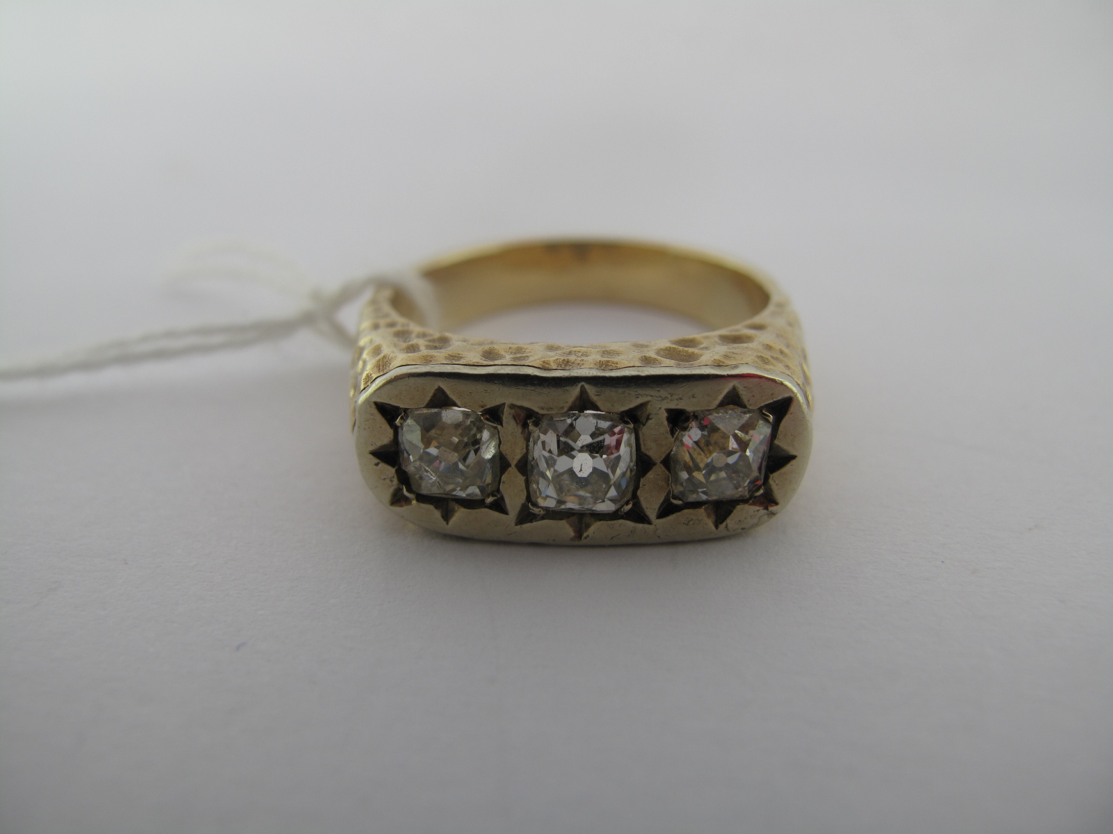 A Gent's Three Stone Diamond Ring, star rubover set to the top with three old cushion cut stones - Image 2 of 7