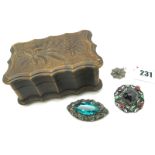 Zoltan White; An Arts & Crafts Brooch, of openwork design, cushion collet set to the centre, stamped
