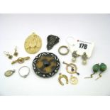 An Edwardian Openwork Pendant, a 9ct gold eternity band, marcasite set dress clip earrings, 9ct gold