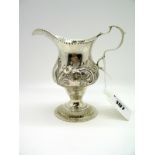 A Hallmarked Silver Cream Jug, (makers mark indistinct) London 1781, with punched dot border and