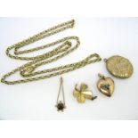 A 9ct Gold Belcher Link Chain, a heart shape locket pendant, an oval locket pendant, four leaf