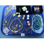 Assorted Costume Jewellery, including Joan Rivers brooch, bead necklaces, clip earrings, etc:- One