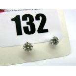 A Pair of Modern 18ct White Gold Single Stone Diamond Earstuds, each brilliant cut stone four claw