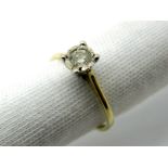 A 9ct Gold Single Stone Diamond Ring, the brilliant cut stone illusion set, stamped ".17".