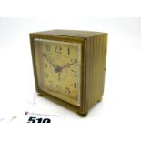 A Small Square Cased Bedside Clock, the signed dial "The Sheffield Goldsmiths Company Ltd Sheffield"