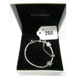 Pandora; A Modern Bracelet, with inset heart shape clasp, safety chain and two heart shape sliding