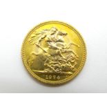 A 1974 Gold Sovereign, (uncirculated).