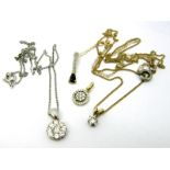 A 9ct Gold Single Stone Pendant, claw set on fine chain, a modern cluster pendant stamped "9K", a