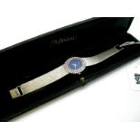 DeLaneau; A Diamond Set Ladies Cocktail Wristwatch, the signed oval lapis lazuli dial within