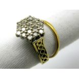 A Diamond Cluster Ring, of hexagonal design, claw set throughout with uniform stones, high between