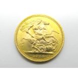 A 1974 Gold Sovereign, (uncirculated).