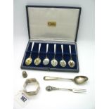 A Highly Decorative Set of Six Hallmarked Silver Gilt and Enamel Coffee Spoons, C&C, London 1967,