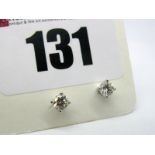 A Pair of Modern 18ct White Gold Single Stone Diamond Earstuds, each brilliant cut stone four claw