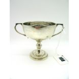 A Hallmarked Silver Twin Handled Pedestal Cup, (makers mark indistinct) London 1931, of trophy form,
