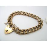 A Curb Link Bracelet, stamped "9", to heart shape padlock clasp stamped "9ct".