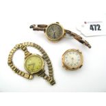 Three 9ct Gold Cased Ladies Wristwatches, each circular dial with Arabic numerals (damages). (3)