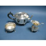 A Matched Hallmarked Silver Three Piece Tea Set, JH, London 1918, CE, London 1919, each with wavy