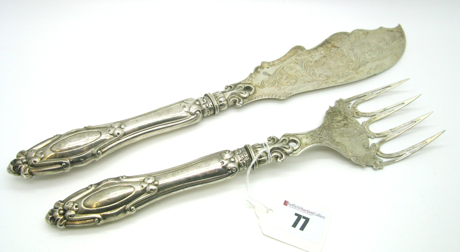 A Highly Decorative Pair of Hallmarked Silver Fish Servers, Hilliard & Thomason, Birmingham 1864,