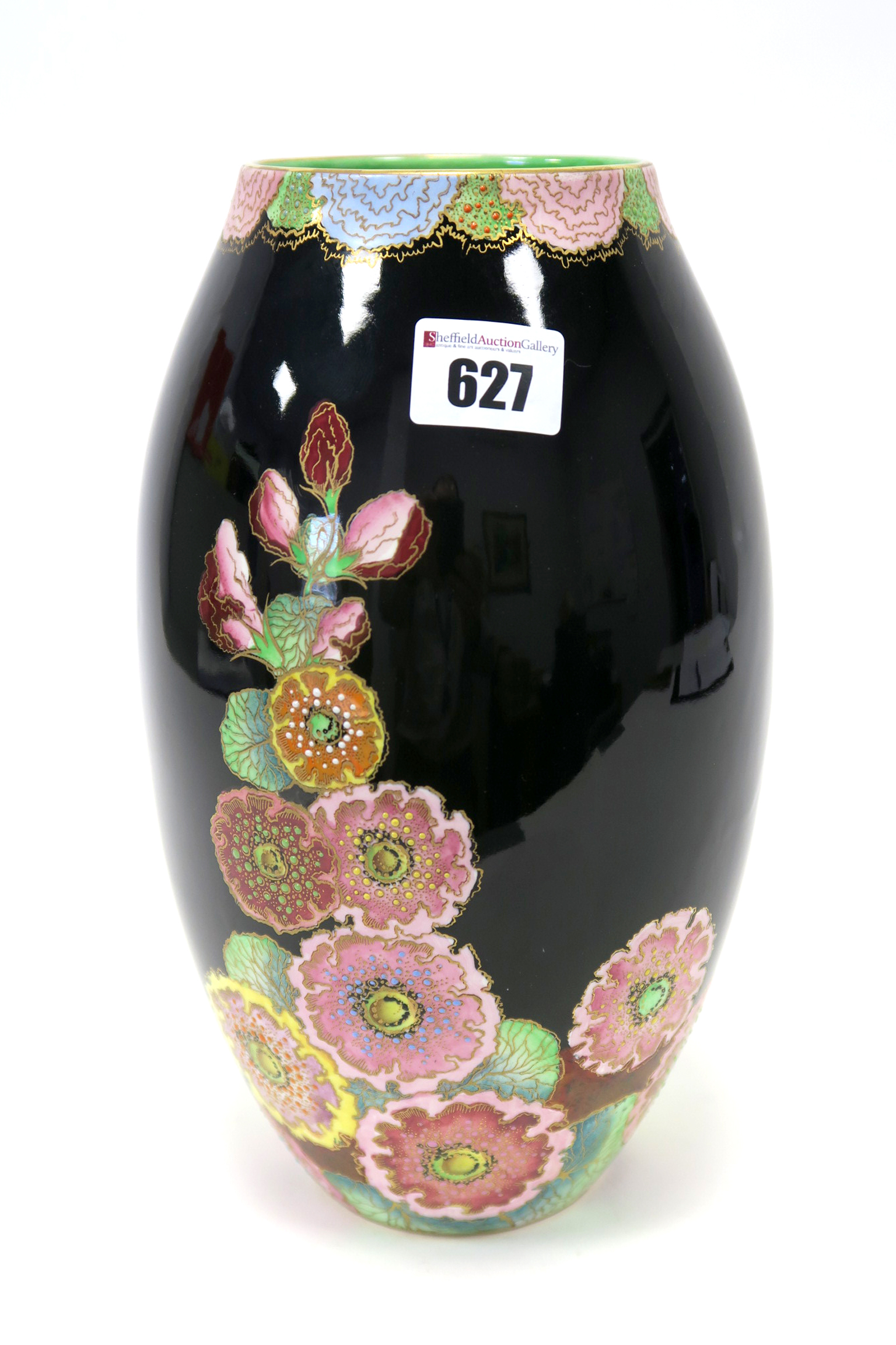 A Carlton Ware Pottery Vase, of ovoid form, decorated in the 'Hollyhocks' pattern with colourful