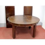 A XX Century Mahogany Wind-Out Dining Table, the oval shaped top with bead and reel frieze, on