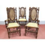 A Set of Five Charles II Style Chairs, with round finials, carved top rail, caned back and seats, on