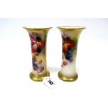A Pair of Royal Worcester Porcelain Vases, of cylindrical form, with flared necks, painted by
