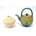 A Mid XIX Century Pottery Majolica Teapot and Cover, modelled in the form of a pineapple, with green