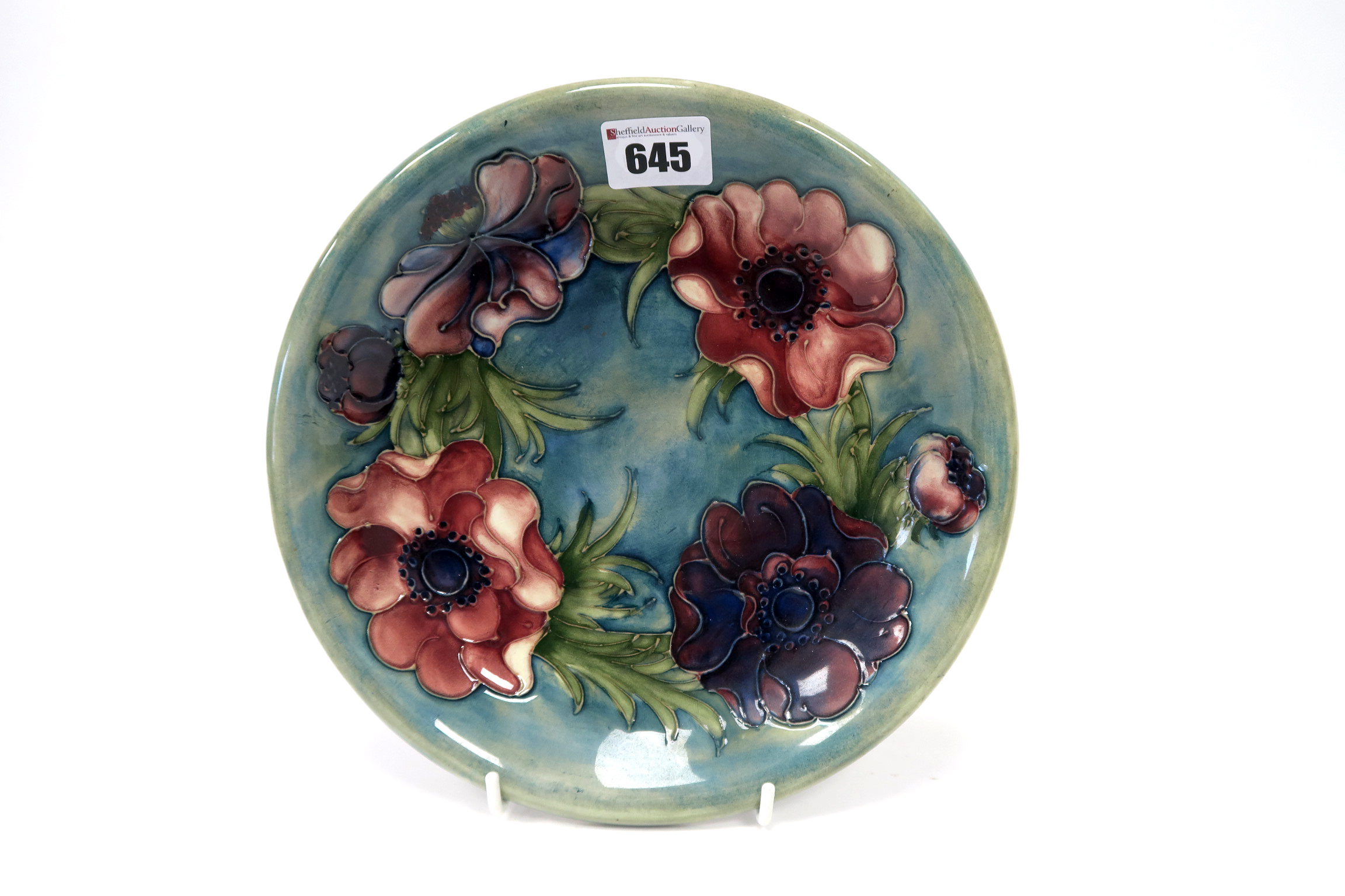 A Mid XX Century Moorcroft Pottery Dish, of circular form, painted in the 'Anemone' pattern with