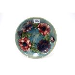 A Mid XX Century Moorcroft Pottery Dish, of circular form, painted in the 'Anemone' pattern with