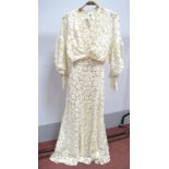 A 1930's Nottingham Lace Wedding Dress, the slim fitting full length dress with 'V' neckline and