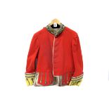 A Late Victorian Officers Red Tunic, with silver bullion and Leicester Regiment collar badge, with