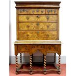 A William and Mary Walnut Chest-on-Stand, the top with stepped pediment, cushion drawer over three