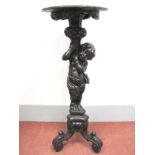 A Late XIX Century Jardiniere Stand, with circular carved top, cherub holding a coronet of