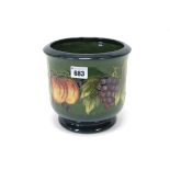 A Moorcroft Pottery Jardiniere, of 'U' shape, painted in the 'Fruit and Vine' pattern designed by