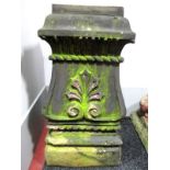 A XIX Century Ornate Chimney Pot, of moulded rectangular section, foliate scroll detailing,